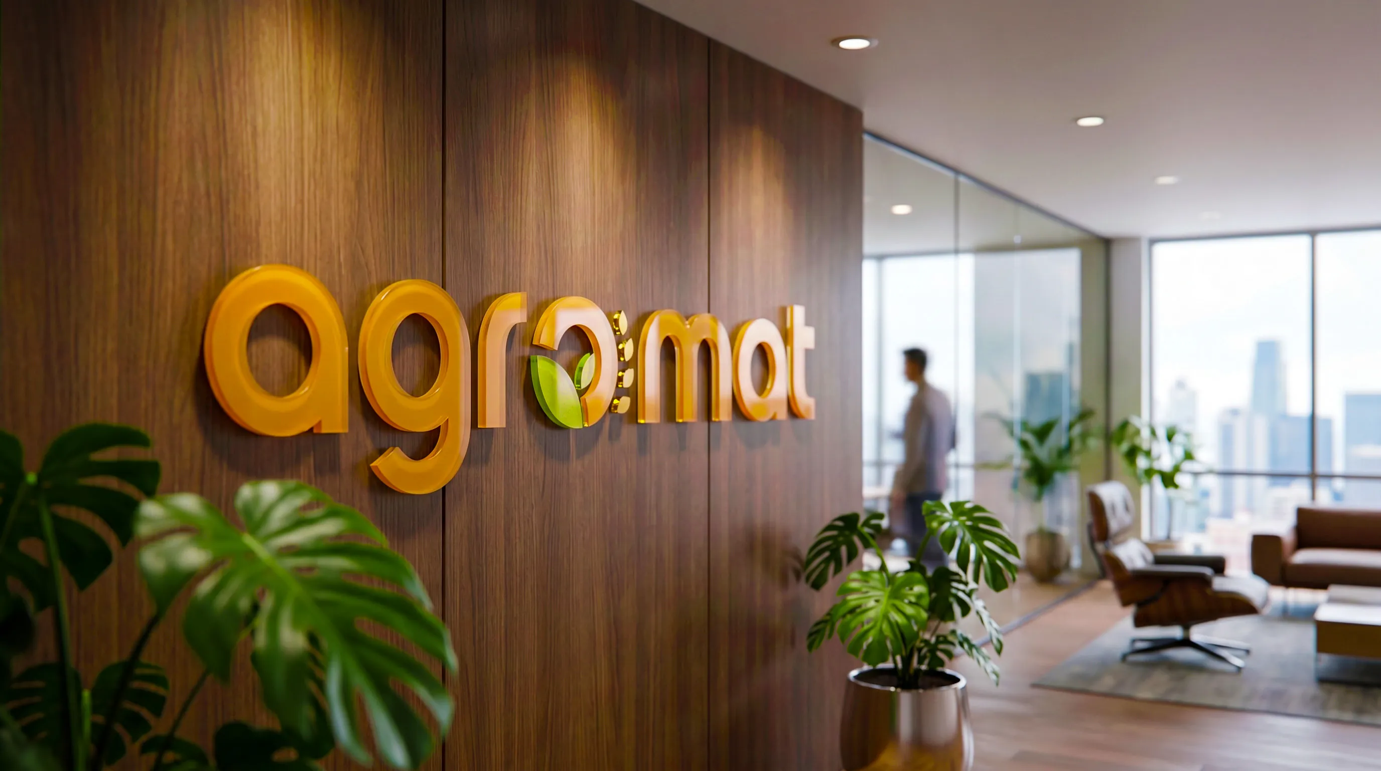 Ambiente corporativo da Agromat com a marca aplicada na recepção